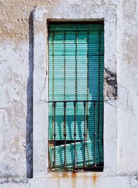 Close-up view of closed blinds on building