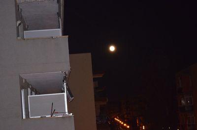 Low angle view of illuminated building at night