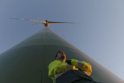 Low angle view of windmill against clear sky