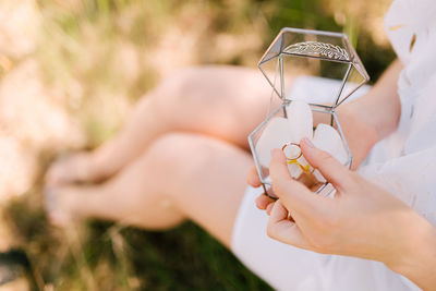 Close-up of woman holding hands