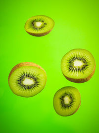 Close-up of lemon slice over white background