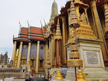 Low angle view of temple against building