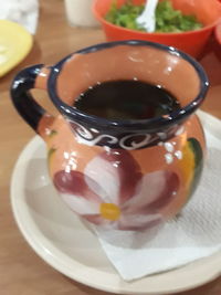 Close-up of tea cup on table