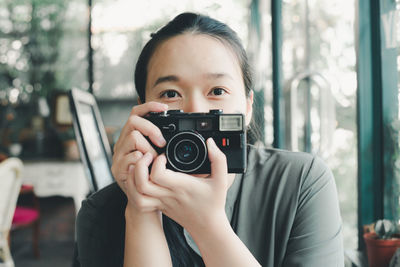 Portrait of man photographing