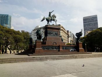 Statue of building in city