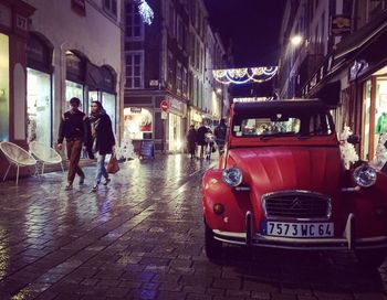 People on street at night