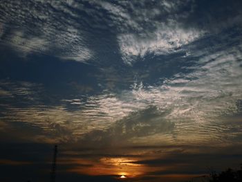 Low angle view of dramatic sky during sunset