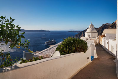 High angle view of sea against clear blue sky