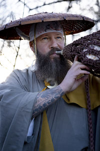 Portrait of man wearing hat