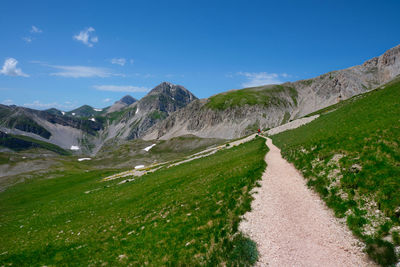 Person who walks the path for the normal way of the summit of the great stone of italy abruzzo