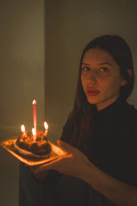 Portrait of young woman in her birthday