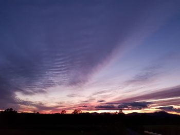 Scenic view of silhouette landscape against sky during sunset
