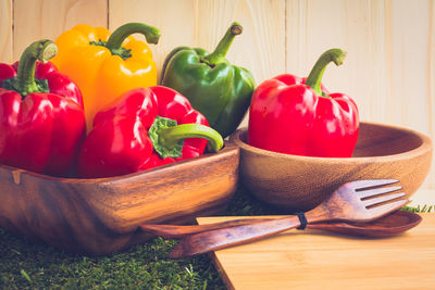 Close-up of red bell peppers on table