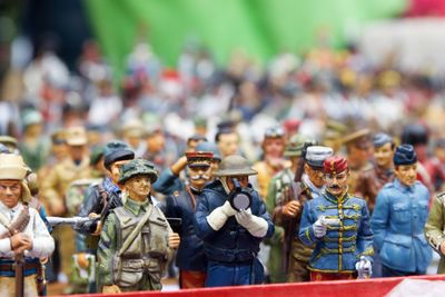 Close-up of army figurines on table