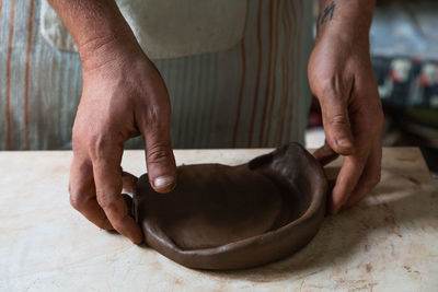 Close-up of man working on table