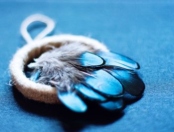 Close-up of dreamcatcher on table