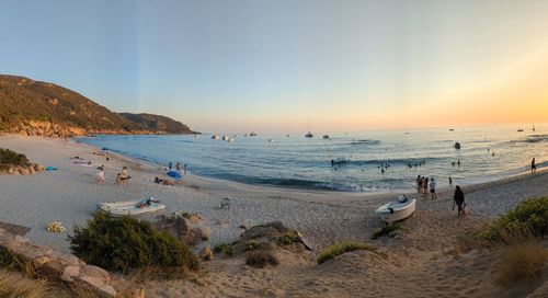 Scenic view of sea against clear sky during sunset