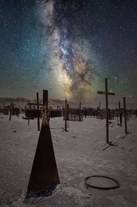 Scenic view of beach against sky at night