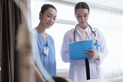 Portrait of doctor working in office