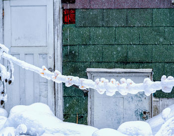 Snow on brick wall