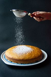 Close-up of hand holding ice cream