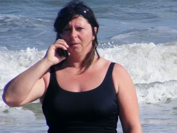 Beautiful young woman on beach