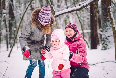 Family in winter landscape