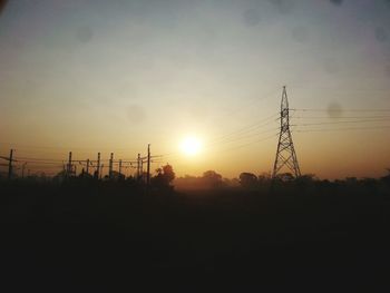 Electricity pylon at sunset