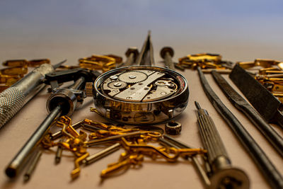 Close-up of clock on table