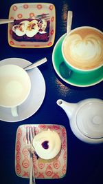 Close-up of cappuccino served on table