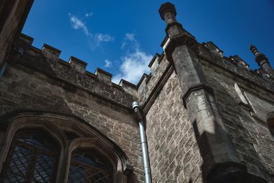 Low angle view of old building against sky