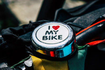 High angle view of text on bicycle bell