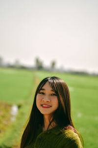 Portrait of a smiling young woman