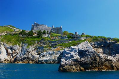 Medieval doria castle, on cliff with sea and clear sky