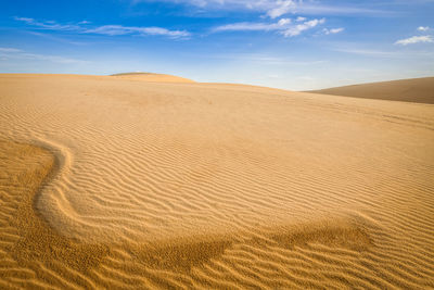 Scenic view of desert against sky