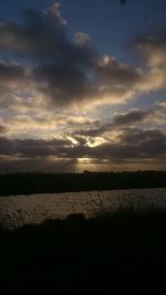 Scenic view of sea at sunset