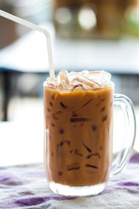 Close-up of coffee cup on table