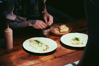 High angle view of breakfast served on table