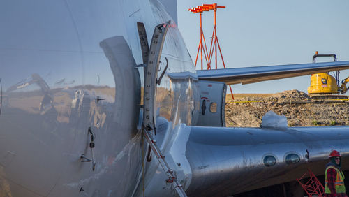 Panoramic view of airplane against clear sky