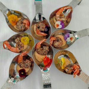 High angle view of various flowers in plate on table