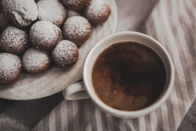 High angle view of coffee cup on table