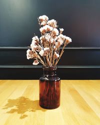 Close-up of glass vase on table