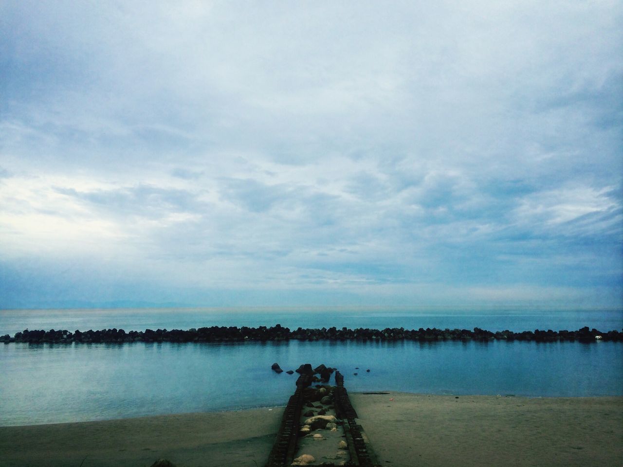 water, sky, sea, tranquility, tranquil scene, horizon over water, cloud - sky, scenics, pier, beauty in nature, nature, cloud, beach, cloudy, railing, idyllic, outdoors, shore, day, calm