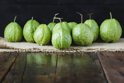 Guavas on wooden table