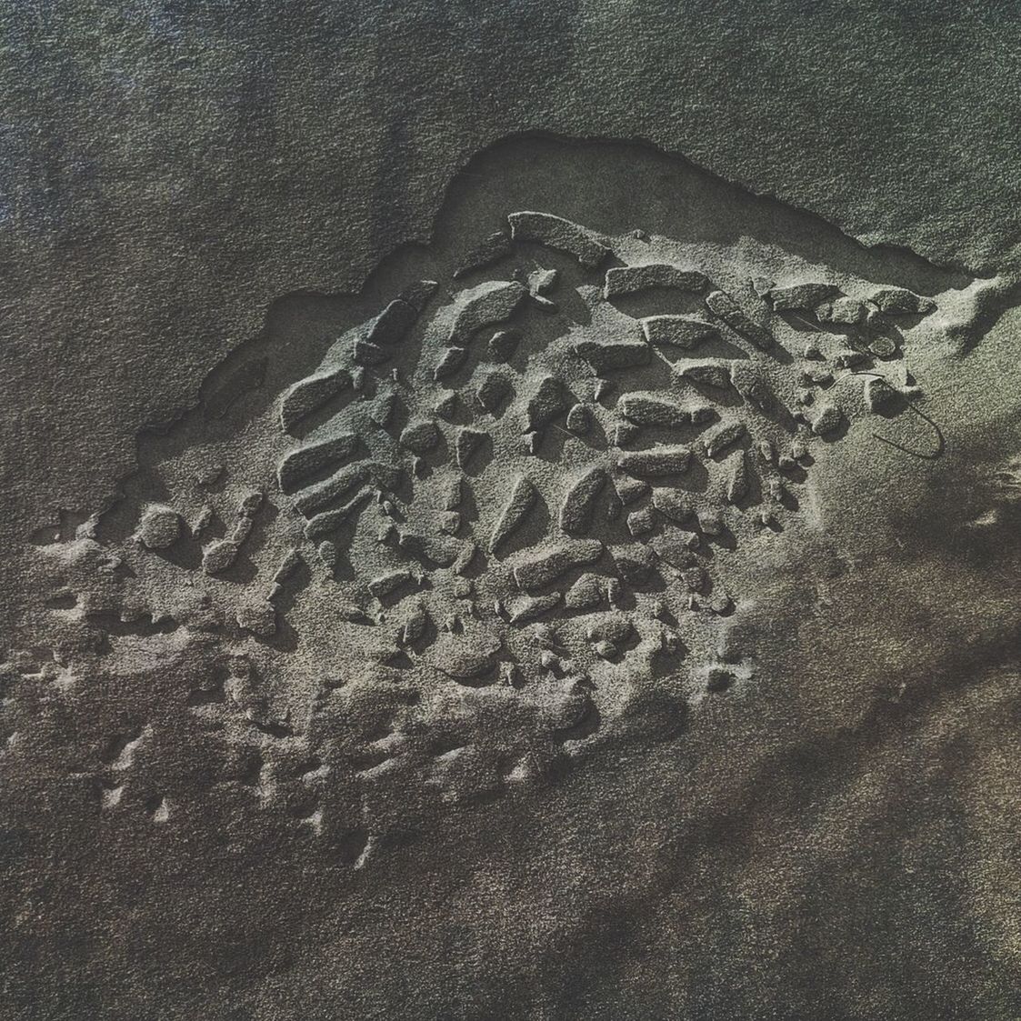 HIGH ANGLE VIEW OF FOOTPRINT ON SAND AT BEACH