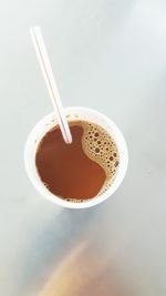 High angle view of coffee cup on table