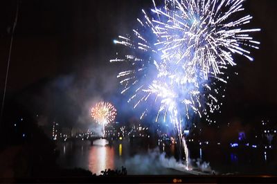 Firework display at night