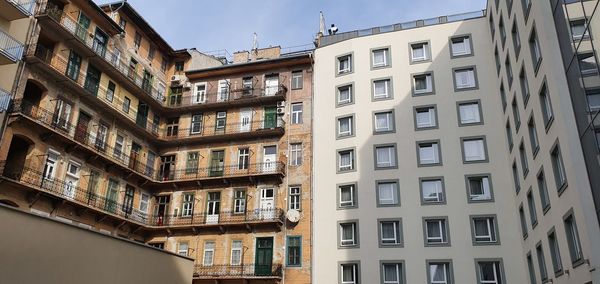 Low angle view of buildings against sky