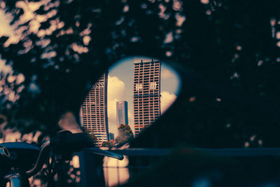 Man and buildings in city at night