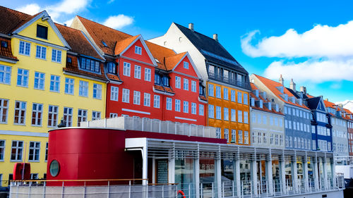 The colorful tale of the ferry, nyhaven, copenhagen, denmark.